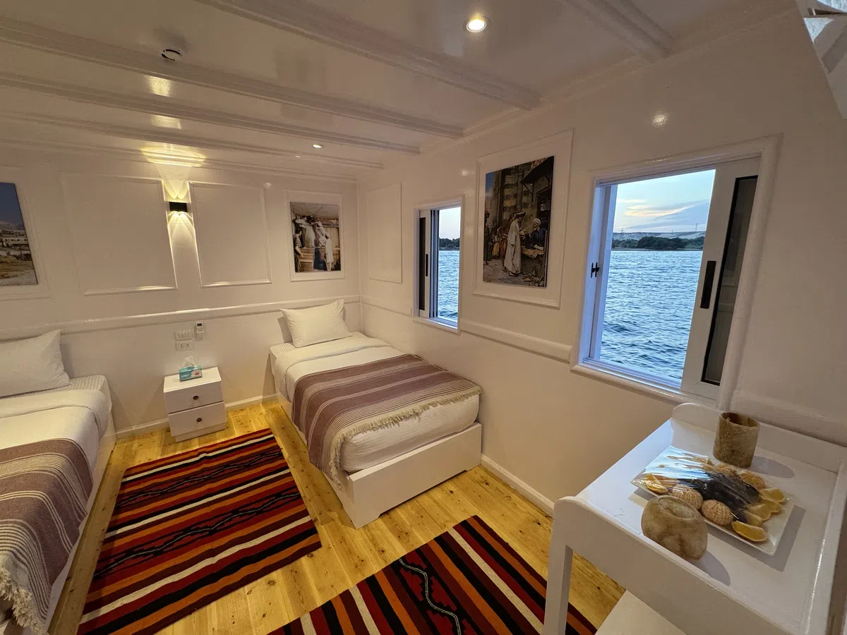 Dahabiya cabin interior aboard Soul of the Nile luxury Nile cruise — 2027 Solar Eclipse trip
